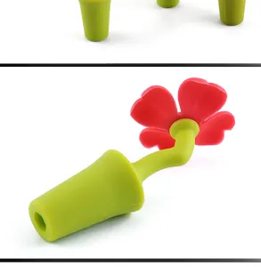 Silikon Weinflaschenverschluss Detailansicht mit niedlichem roten Blumendesign und grünem Stiel.