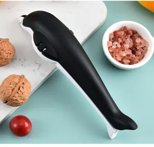 Dolphin shaped chestnut opener and nutcracker close-up detail view kitchen gadget tool