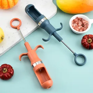 Dénoyauteur de fruits manuel pour dattes rouges et cerises, outil de cuisine principal.