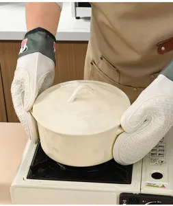 Thick silicone heat-resistant oven mitts for kitchen baking and safe pot handling.