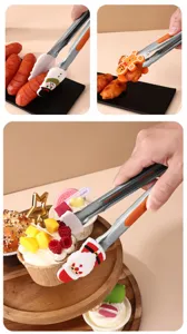 Christmas theme food tongs with stainless steel handle and heat-resistant silicone tip.