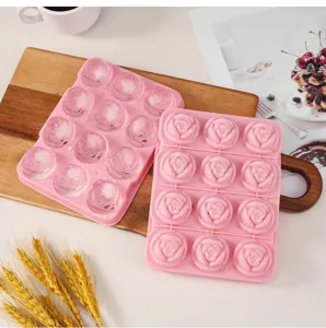 Silicone 12-grid rose ice cube mold detail, flexible pink ice maker tray for home bar and kitchen use.