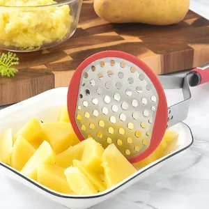 Stainless steel potato masher kitchen tool with red silicone rim for easy baby food mashing