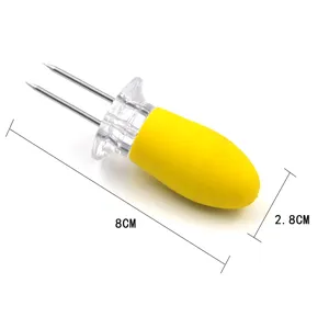Stainless steel corn holder detail view, yellow handle with dual prongs, 8cm long BBQ fork.