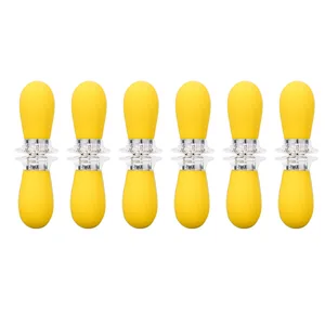 Set of 6 yellow silicone handle stainless steel double corn holders for BBQ kitchen cooking.