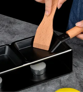 Mini appareil à raclette double plateau de détail avec poêle anti-adhésive de qualité bois.