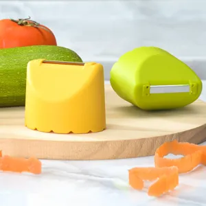 Stainless steel vegetable peeler with anti-splash design, yellow and green kitchen fruit peelers.