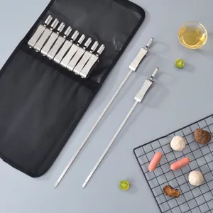 Stainless steel BBQ skewers set with practical storage bag for outdoor grilling tools.