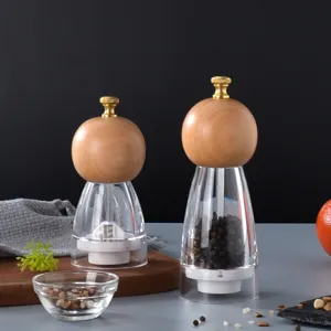 Manual wood pepper and sea salt grinder, clear glass seasoning mill for kitchen cooking dining.