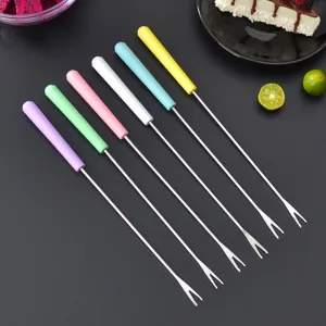 Stainless steel fondue forks set with colorful heat-resistant plastic handles for fruit dessert BBQ.