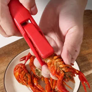 Red crayfish peeling tool and lobster shell opener for easy seafood preparation main view