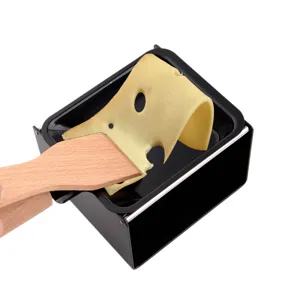 Mini cheese raclette grill with wooden spatula and non-stick baking pan for home use.