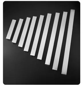 Detailed view of multi-size magnetic knife holder for kitchen wall mounting storage.