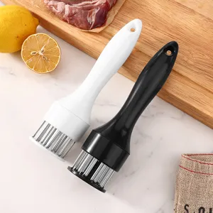 Kitchen meat tenderizer tool with stainless steel needles and ergonomic handle in black and white.
