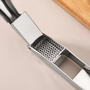 Stainless steel garlic press heavy duty manual garlic mincer kitchen tool for cooking.
