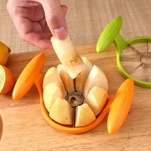 Stainless steel fruit slicer and apple corer with dual handles for easy 8-slice cutting.