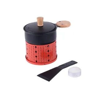 Portable mini round cheese melting raclette set with wooden handle, grill pan, and candle.