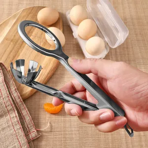 Stainless steel egg slicer kitchen tool for hard boiled eggs and fruits, durable and easy.