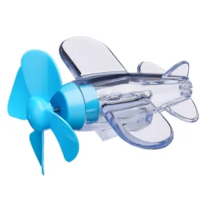 Transparent airplane toy and car ornament with blue propeller, cute desktop decoration.