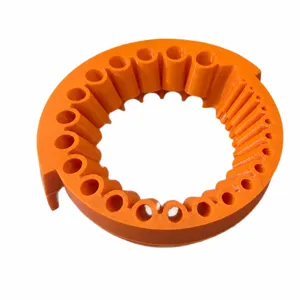 Orange plastic internal component for multi-functional drill bit sharpener with multi-hole design.
