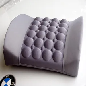Grey car massage lumbar cushion with ergonomic support bumps for comfortable driving experience.