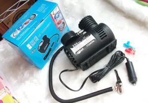 Tragbarer Auto-Luftkompressor Detailansicht zeigt Manometer und praktische Aufblasdüse.