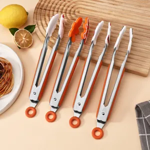 Stainless steel food tongs with Christmas silicone tips, heat-resistant BBQ kitchen tool.
