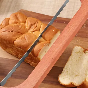 Wooden bread knife with serrated blade for slicing toast and sandwiches in kitchen, main view.