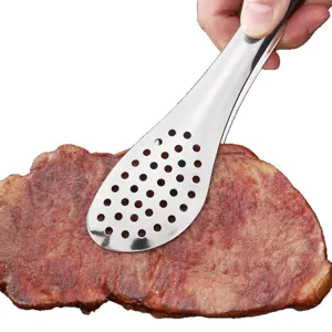 Stainless steel food tong with draining holes, ideal for barbecue, steak, and kitchen use.