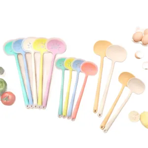 Colorful silicone slotted spoons with long handles and cute hollow sun patterns for kitchen.