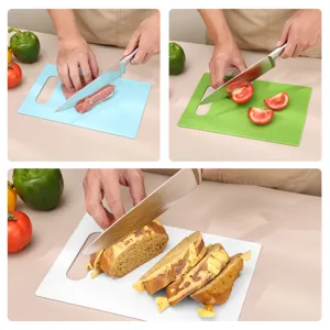 Household double-sided anti-slip cutting board PP plastic chopping board for kitchen use.