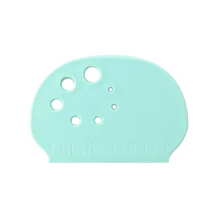 Thickened plastic baking scraper with scale and holes, durable kitchen tool for dough cutting.