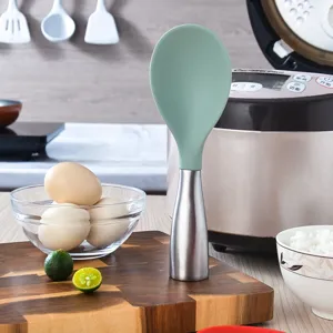 Standable silicone rice paddle with stainless steel handle, ideal for kitchen cooking use.