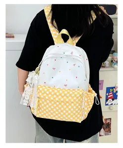 Niedlicher Cartoon Polka Dot karierter Schulrucksack für Schüler, stylischer Tagesrucksack.