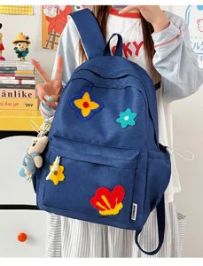 Stijlvolle nylon grote capaciteit schoolrugzak met leuke kleurrijke bloemenborduurwerk.