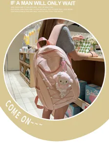 Schicker rosa karierter Rucksack mit Schleife und tollem Plueschanhaenger fuer Schule.
