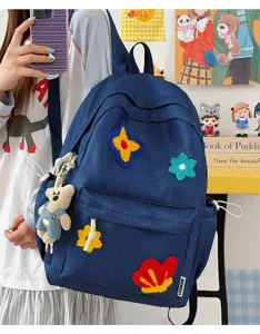 Leuke nylon rugzak met bloemborduring en berenhanger voor studenten en schoolgebruik
