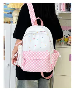 Süßer rosa karierter und weißer gepunkteter Rucksack für Schülerinnen, modische Schultasche.