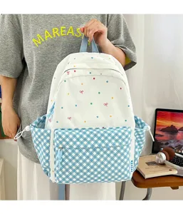 Süßer Schulranzen mit Punkten und Karomuster, praktisches Design für den täglichen Weg zur Schule.