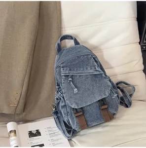 Vintage gewassen denim mini rugzak detail, casual multifunctionele dagelijkse rugzaktas.