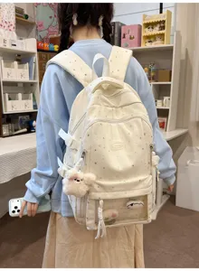 Detailansicht des Sternmuster-Schulrucksacks mit transparentem Fronttaschen-Design.