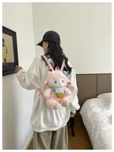 Cute cartoon lamb plush backpack detail view, soft furry fabric, sweet style for daily wear.
