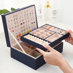 Multi-layer leather jewelry box with large capacity for rings, earrings and accessories.