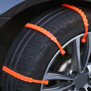 Universal car snow chains for tires, orange plastic cable tie design, close-up main view.