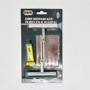 Tubeless tire repair kit with T-handle tools, rubber strips and glue for emergency tire patch.