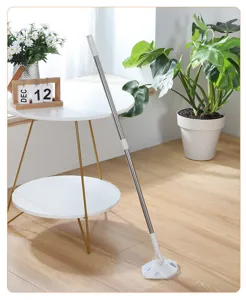 Adjustable flat mop with extendable metal handle for home floor cleaning and dust removal.