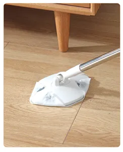 Flat floor dust mop with telescopic handle for easy home cleaning and daily floor care use.