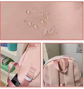 Detailansicht des rosa Karierten Schulrucksacks mit wasserdichtem Stoff und stabilen Gurten.
