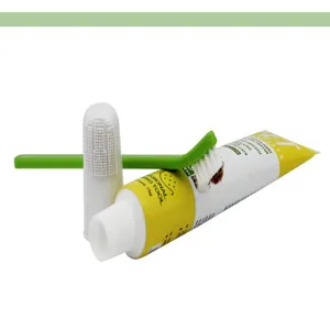 Pet toothpaste and toothbrush set, silicone finger brush and dual-head brush for oral care.