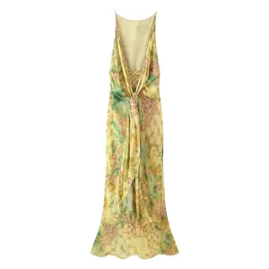 Sleeveless floral long dress detail featuring elegant abstract print and front drape knot design.
